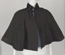 Wool cape with beaded neckline