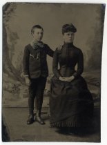 Tintype portrait of boy and young woman, 1886