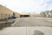 Rear of Sunlite Baking Co. building with loading dock, 2022