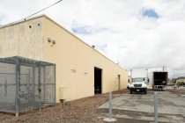 Oblique view of south portion of Sunlite Baking Co. primary facade, 2022