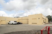 Oblique view of Sunlite Baking Co. south wall and additions, 2022