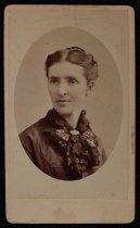 Portrait of woman with hair comb and lace collar