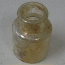 Field Archeology, round glass bottle