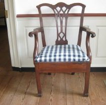 Chippendale armchair is in Gothic style with a pierced splat.