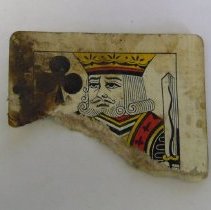 Top piece of king of black clubs Bicycle playing card