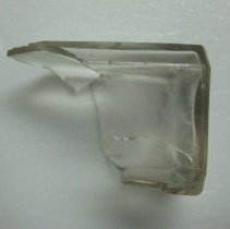 Colorless bottle base; blown-in-mold French square sherd.
