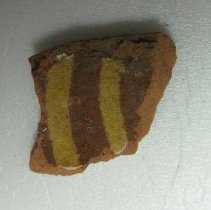 Redware sherd; slip trailed, 1 with copper splash.