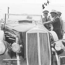 L. G. Phares and President Franklin Roosevelt's car and driver