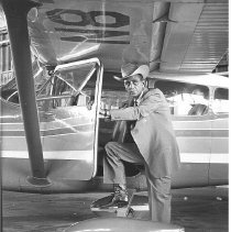 Pete Rogers boarding plane