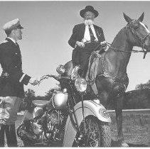 John R. Hughes with Highway Patrol Officer