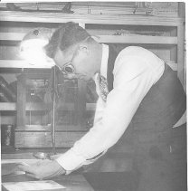 Examining fingerprints from safe, Latent Fingerprint Section, BIR