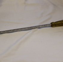 Large screwdriver used by Frank Malinak when he worked Highway Patrol/Weights and Measures