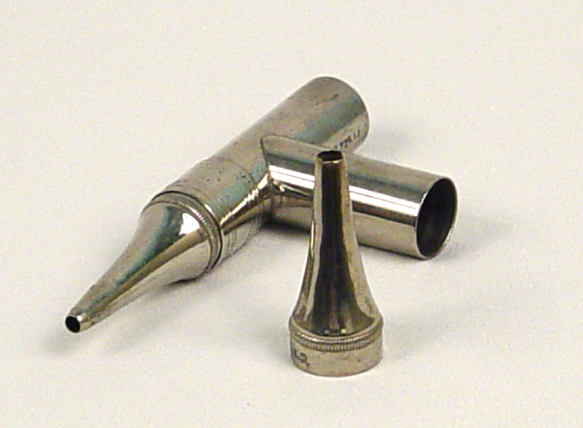 Grey metal otoscope heads with tapered ends.