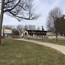 East Side View of School with Lawn in Foreground during Demolition