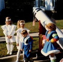 Children Waiting by Rocket Float