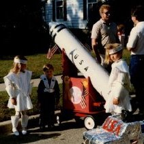 Children Waiting by Rocket Float and Landrover