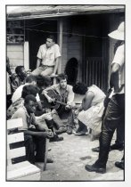 Bob Dylan plays behind the SNCC office.