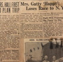 Newspaper clipping describing the celebration in New York City upon the completion of the Post-Gatty World Tour in that the wives of Wiley Post and Harold Gatty ensured their arrival to greet their husbands.