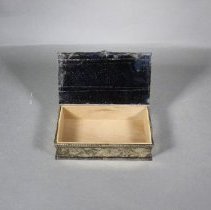 Silver cigarette box, interior view