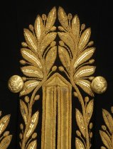 Detail of rear buttons and embroidery 1