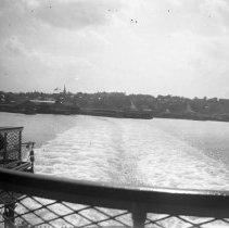 E. Alice Austen, Staten Island from rear of Staten Island ferry, ca. 1900.