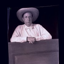 E. Alice Austen, [Peter Austen Leaning on Door], ca. 1905