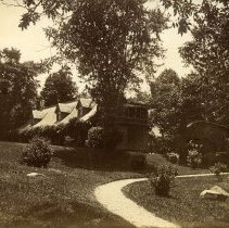E. Alice Austen, [View of Clear Comfort from the gate], ca. 1910
