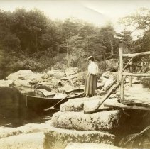 E. Alice Austen, Trude Eccleston [watching] Mrs. Smalley in boat, 1896