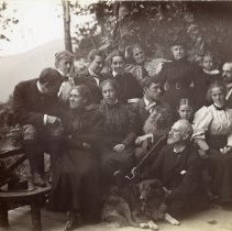 E. Alice Austen, [Large group posed beside an overlook], ca. 1897
