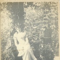 E. Alice Austen, E.A.A., full length self-portrait, with fan, 1892.