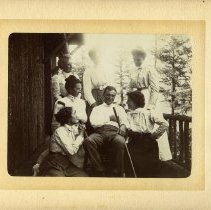 E. Alice Austen, [Catskills: Group Posed on porch], 1899.
