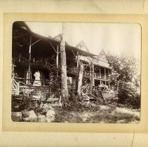 E. Alice Austen, [Gertrude Tate on the Porch], 1899