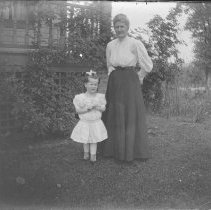 E. Alice Austen, [Woman and Girl Beside House], ca. 1892