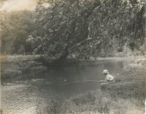 Child fishing in Osage Creek
