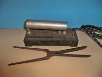 Curling iron and heating unit from the Master Electric Co., Chicago