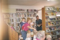 Frank Thomason and others enjoy an Eagle Public Library storytime