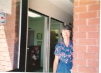 Barbara Montgomery next to a column.