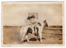 Two girls on a pony at Pleasant View School