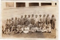 Students posing next to the Pleasant View School building