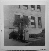 Grandma Fluharty in front of Eagle Grade School
