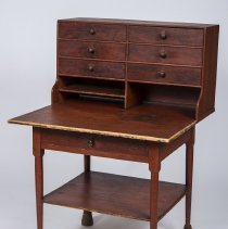 Sewing table with post-Shaker risers