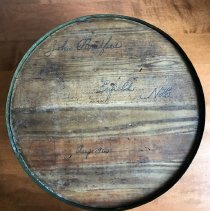 Inscription under lid