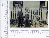 Don, Larry, & Stan Smith in front of house in Meeteetse