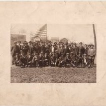 Draftees leaving Potsdam, Cecil Bostick, Sissonville, in plaid cap,kneeling