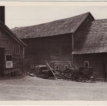 Barn with buggies & sleighs, Raymond St., 1920's.