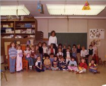 (a) Brookside Elementary School student's group photo.
