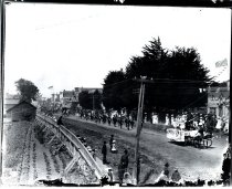 Parade with horse-drawn floats, Main Street, Mendocino.