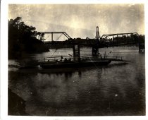 Big River Bridge, damaged by 1906 earthquake. Ferry in foreground.