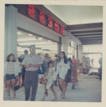 Exterior view of Kress main entrance with customers