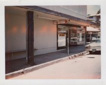 Exterior view of Ben Franklin hanging sign